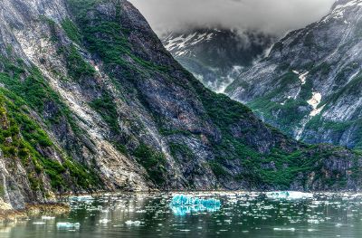 mountain cliffs near a lake