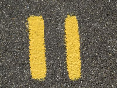 number 11 painted on asphalt