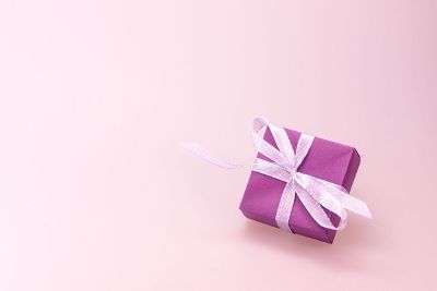 purple box with pink ribbon