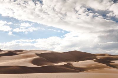 barren desert and cloudy sky