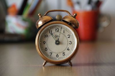 old fashioned alarm clock on desk