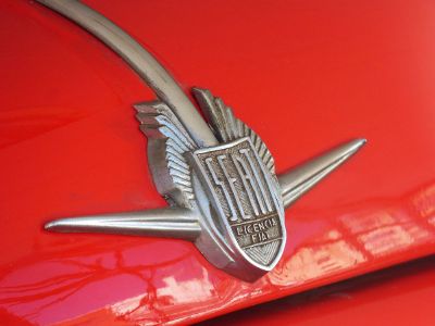 fiat emblem against a red background