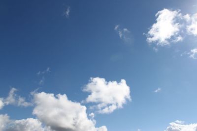 clouds floating in blue sky