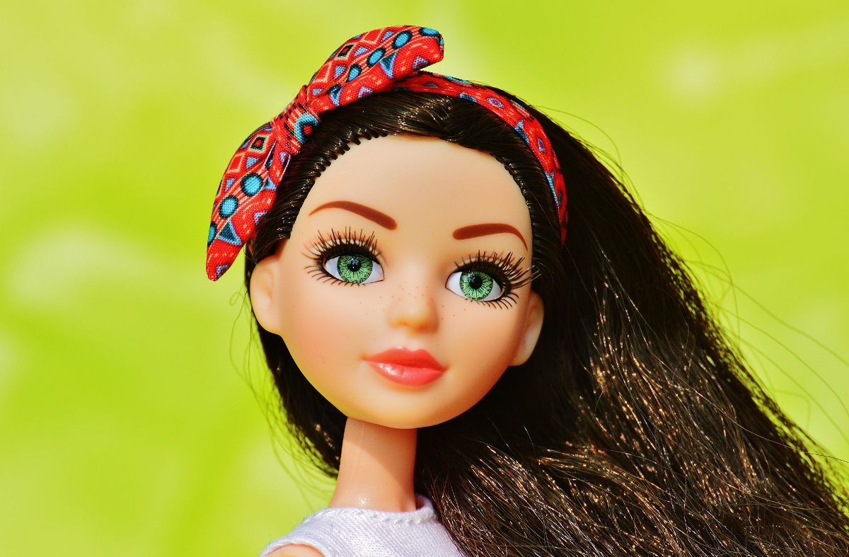 brunette barbie doll with blue eyes