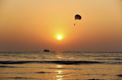 parasailing at sunset