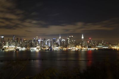 night view of skyscrapers on waterfront