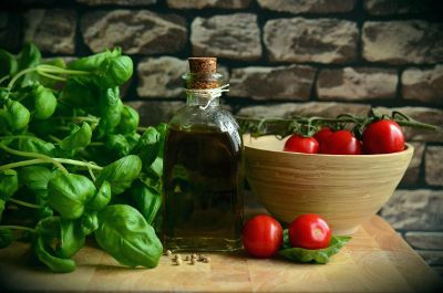 basil and tomatoes with oil