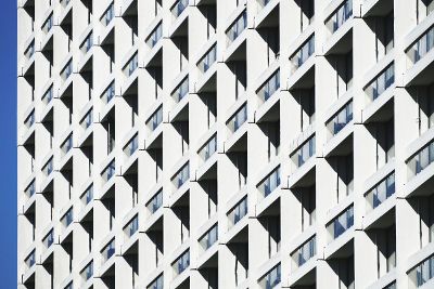 high rise building with glass balcony