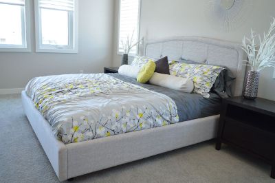 clean and decorated grey bedroom