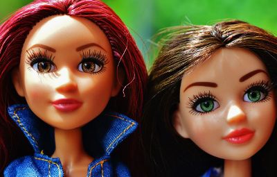 two female barbie type dolls