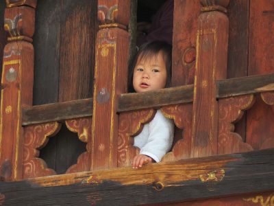 foreign girl looks out window