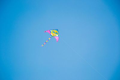 a colorful kite on the sky