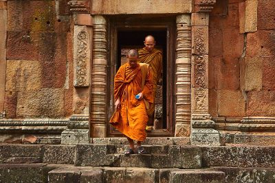 monks leaving a building