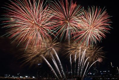 fireworks with city in background