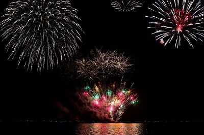 celebration with fireworks at lake