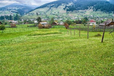 field in mountain village