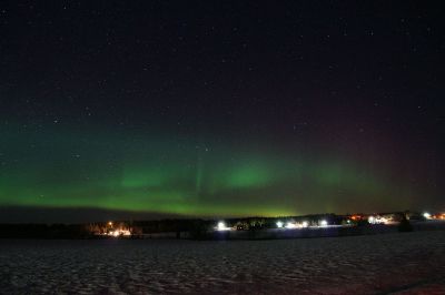 northern lights over a campsite