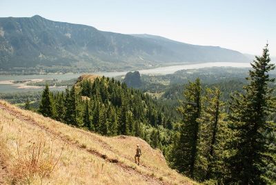 hiker looking onto a valley