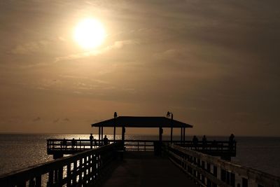 a pier at sunset