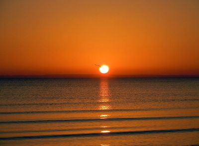 setting sun over ocean