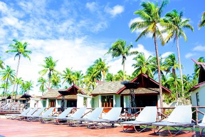 row of chairs at tropical resort