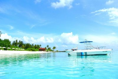 boat by tropical beach