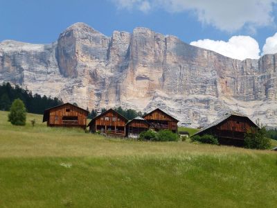 cabins in front of a mountain
