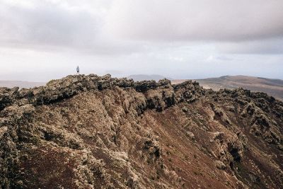 a man standing on a mountain