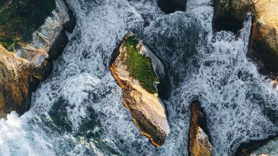 aeriel view of ocean and cliffs