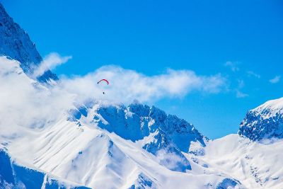 snowy mountain hang gliding