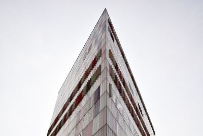 pointy building on a cloudy day