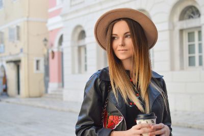 lady in a hat with coffee