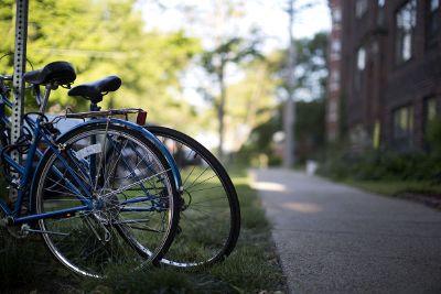 bikes parked on the sidewalk