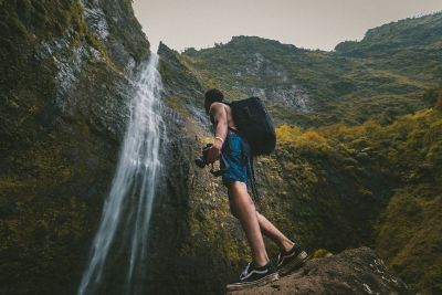 below a waterfall