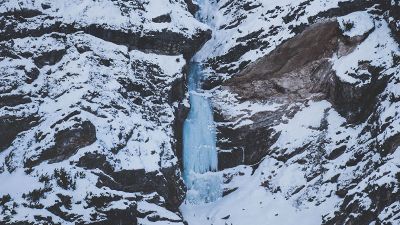 frozen waterfall on mountain