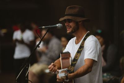 guitar singer with hat