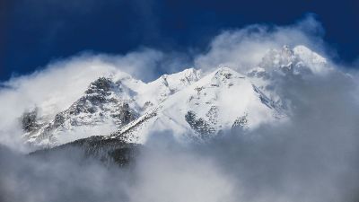 mountain view with snow and fog