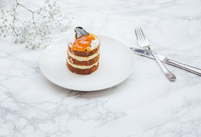 layered dessert on marble table