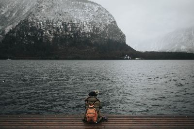 person sitting on a dock