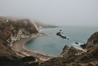 foggy view of secluded beach