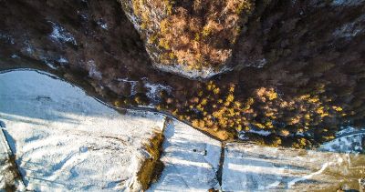 snow covered mountains with tree canyon