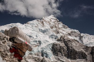 icy mountain with climber tools