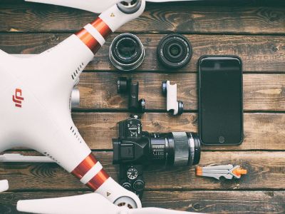 camera and lenses on wood