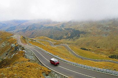 van driving on rural road