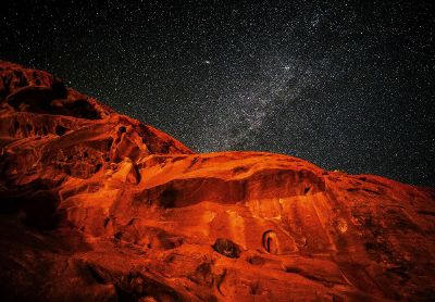 nightime sky over red rocks