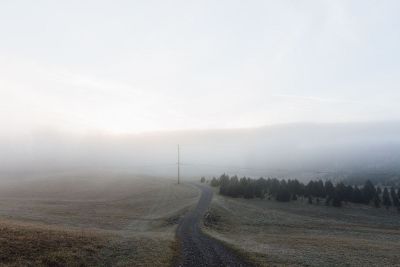 road leading to fog