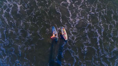 surfers on the beach