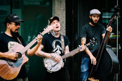 three men playing music