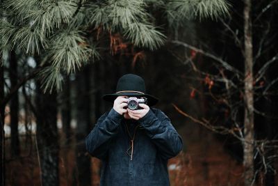 photographer in the woods