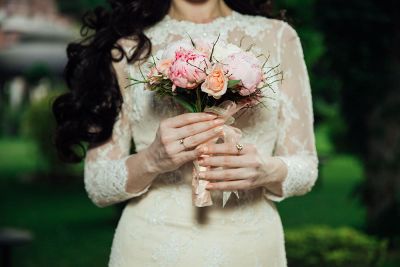 chick holding bouquet of flowers